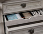 Bruchandi Three Drawer Night Stand