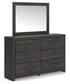 Delmorta Full Panel Storage Bed, Dresser, Mirror and Nightstand