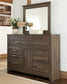 Juararo Queen Panel Bed with Mirrored Dresser, Chest and Nightstand
